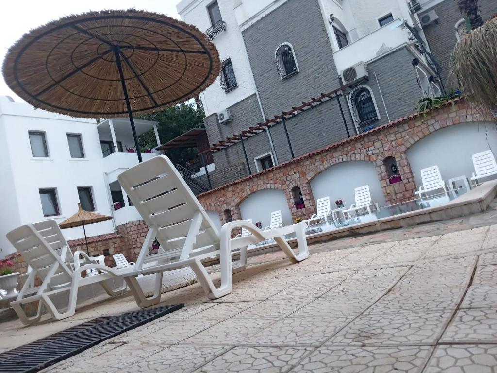 Kép Central and Comfortable Apartment with Shared Pool near Beach in Bodrum szállásáról Bodrumban a galériában