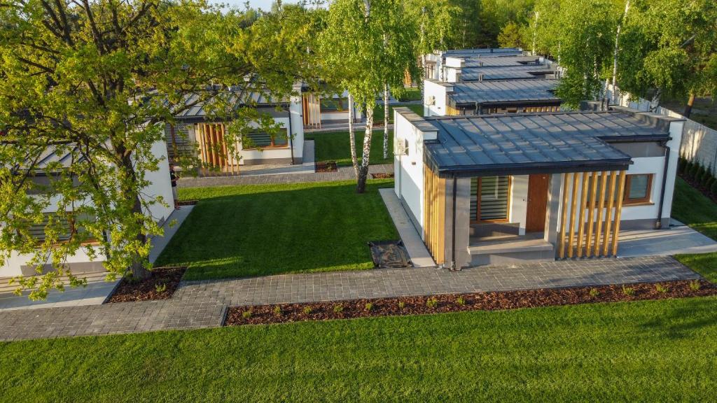 an aerial view of a house with a yard at Riviera Camp in Radłów