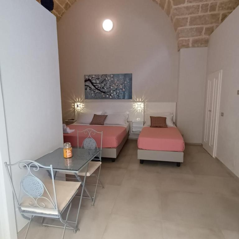 Postel nebo postele na pokoji v ubytování Dimora Mazzini - Salento Selection