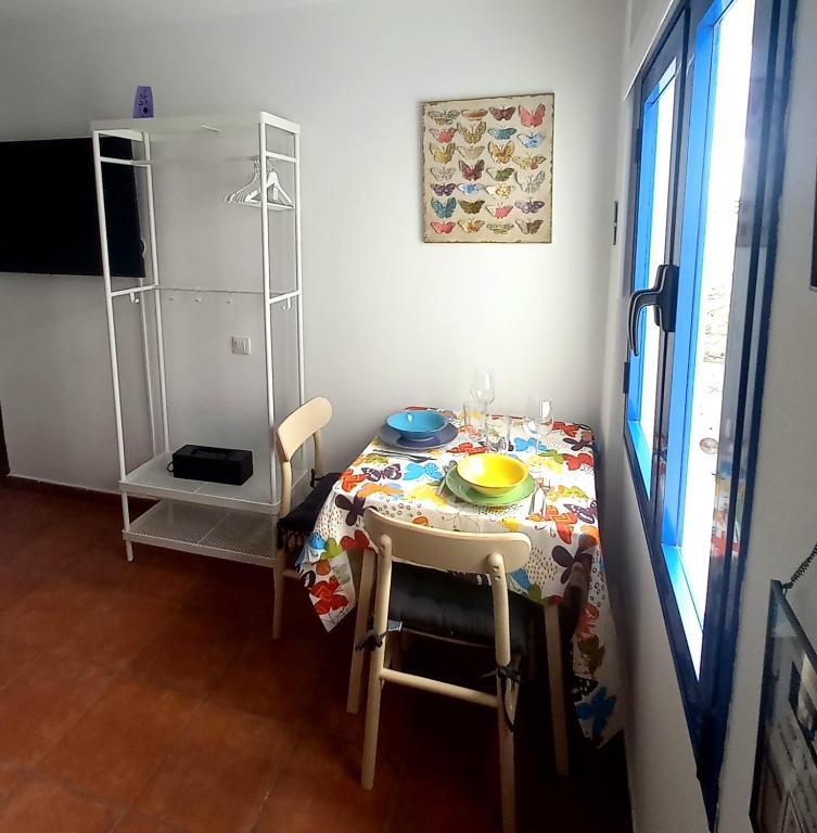 TV a/nebo společenská místnost v ubytování Casa Pescado y mariposas