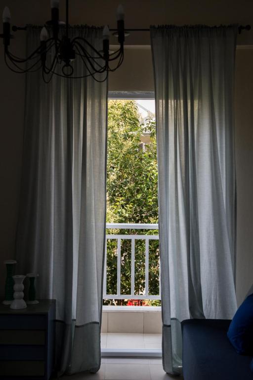 A balcony or terrace at Blue Theros Apartments