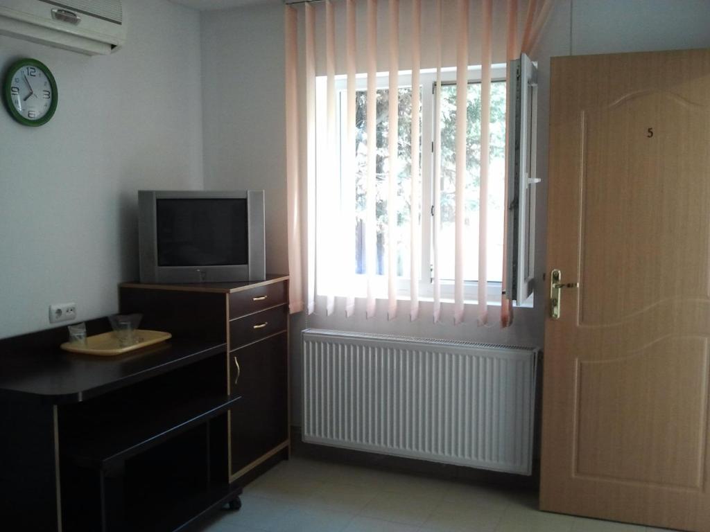 TV a/nebo společenská místnost v ubytování JR Motel