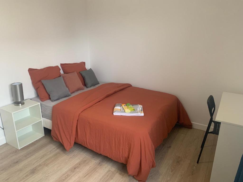 Posteľ alebo postele v izbe v ubytovaní Villa Tenjin chambre 14