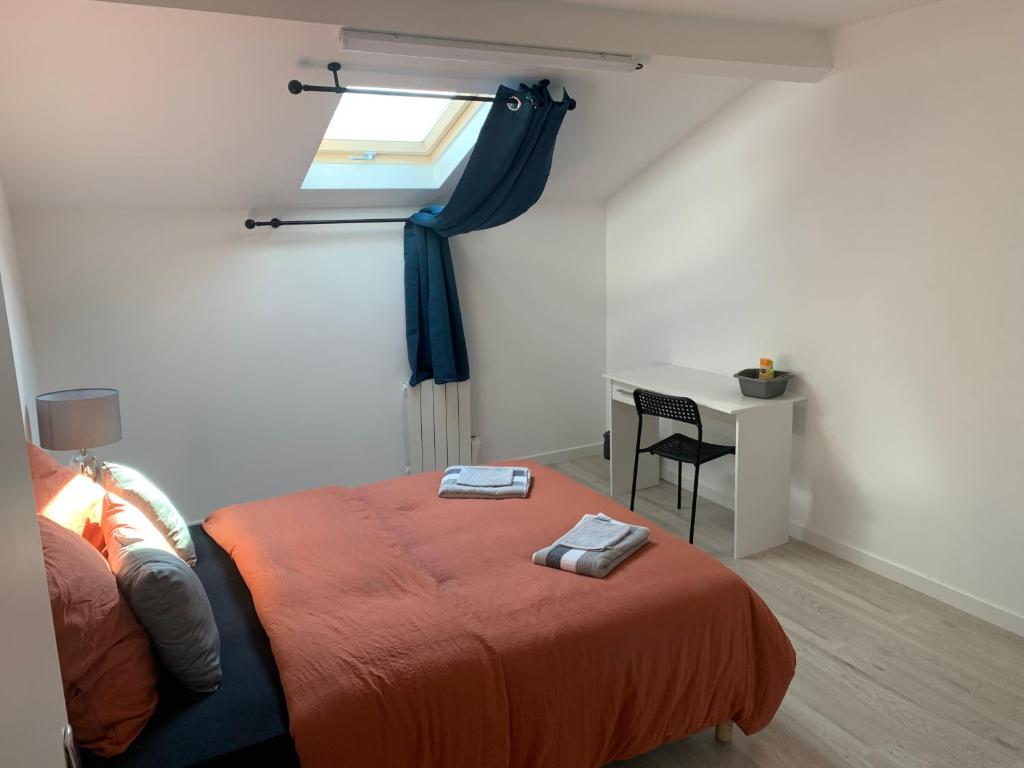 Posteľ alebo postele v izbe v ubytovaní Villa Tenjin chambre 14