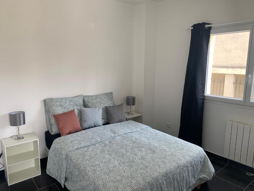 Posteľ alebo postele v izbe v ubytovaní Villa Tenjin chambre 14