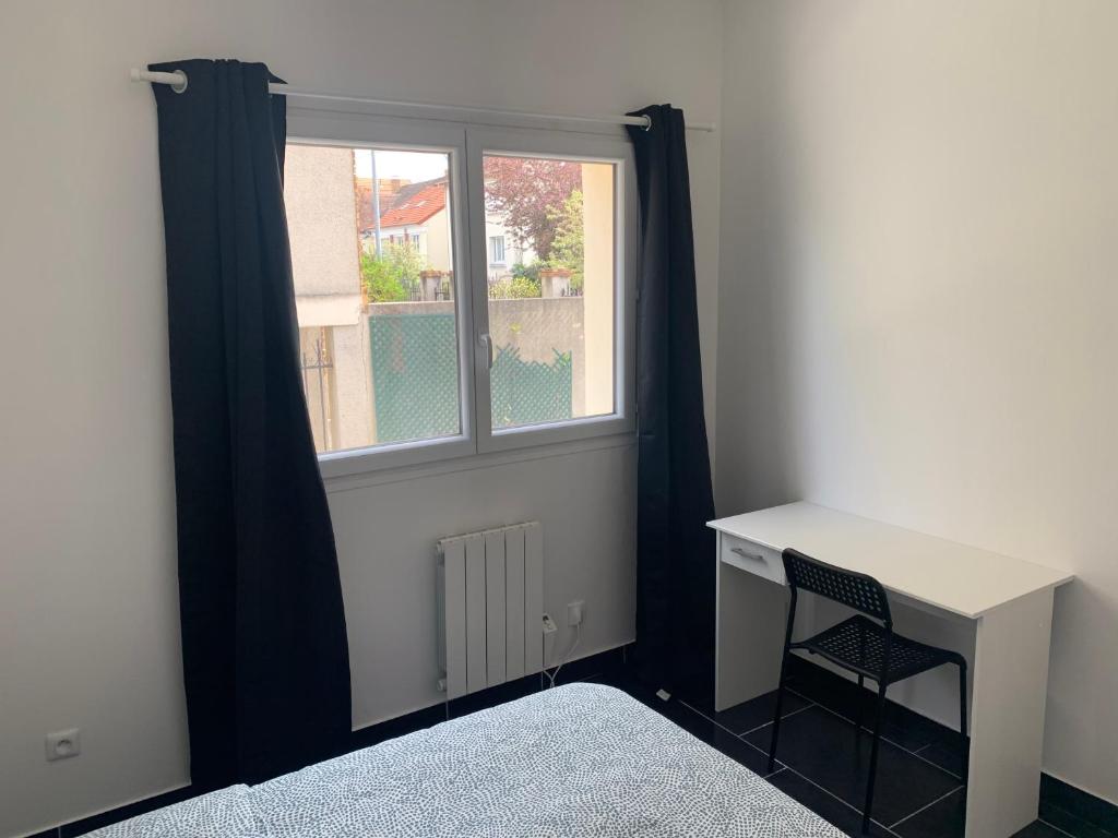 Posteľ alebo postele v izbe v ubytovaní Villa Tenjin chambre 14