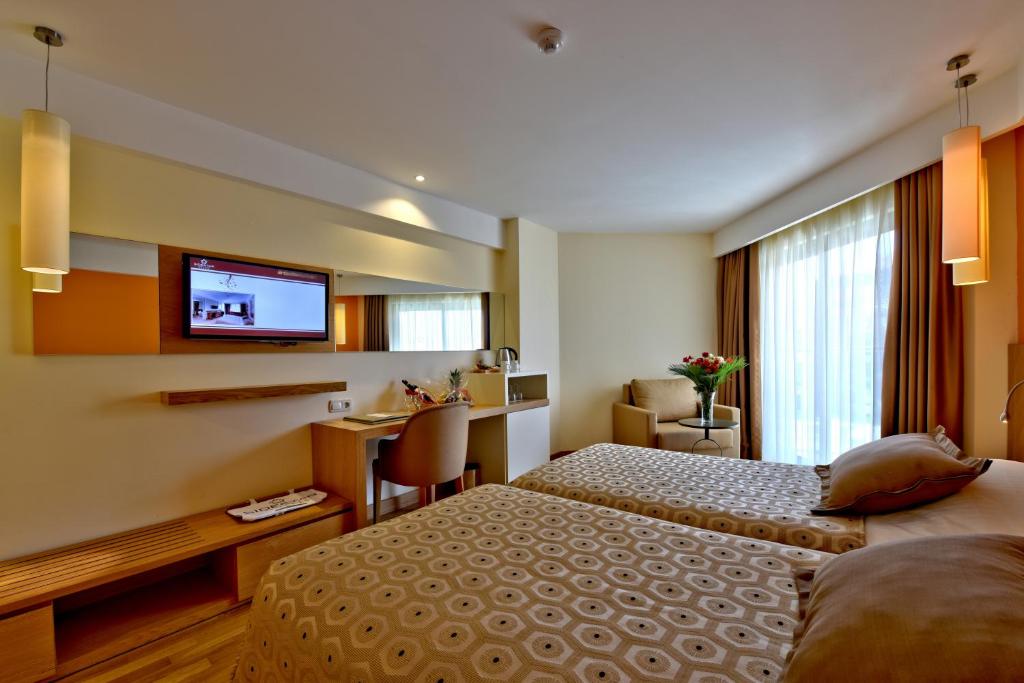 Postel nebo postele na pokoji v ubytování Side Star Beach Hotel - Ultra All Inclusive