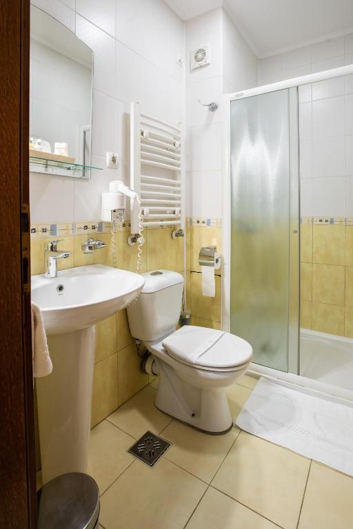 Koupelna v ubytování Hotel Vila Lago