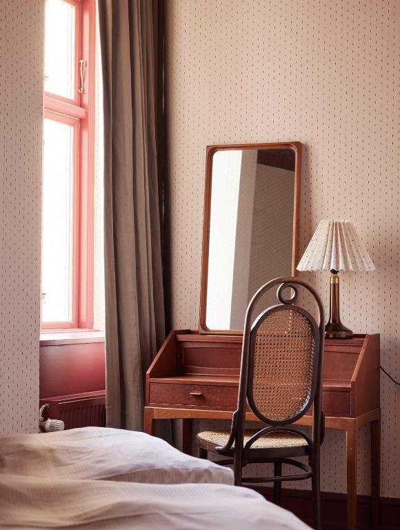 Postel nebo postele na pokoji v ubytování Rye115 Hotel