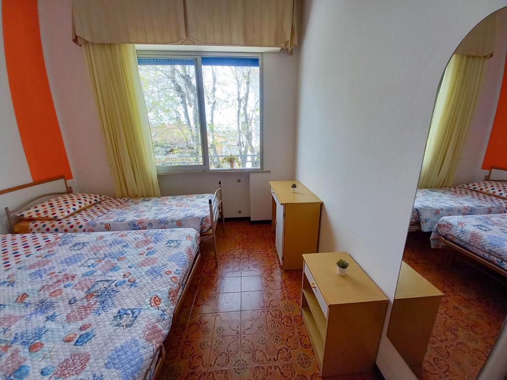 A bed or beds in a room at PetlyApartments