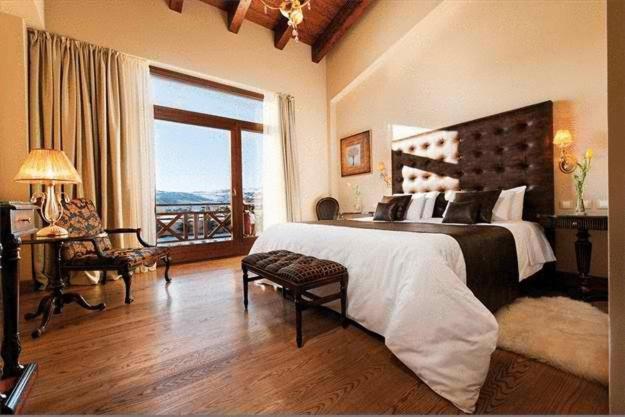 Postel nebo postele na pokoji v ubytování Tagli Resort & Villas