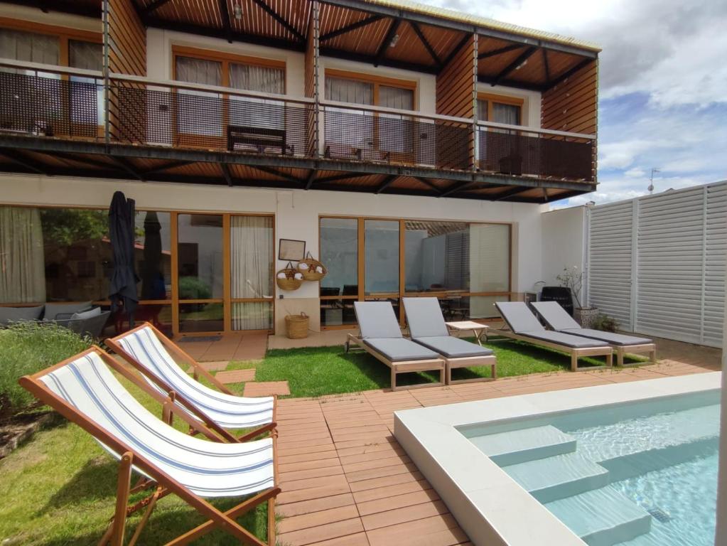Bazén v ubytování Eco-Hotel Doña Mayor nebo v jeho okolí