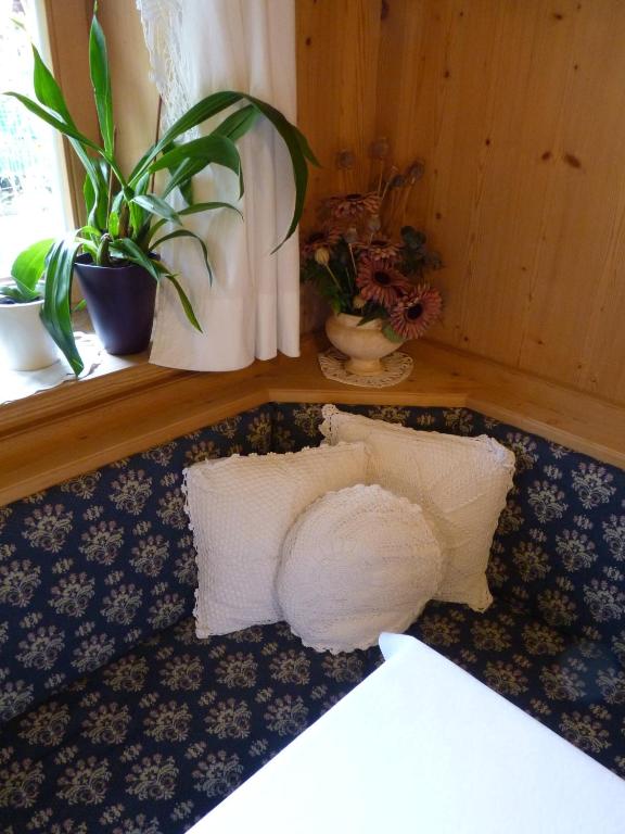 Postel nebo postele na pokoji v ubytování Garni Pineta