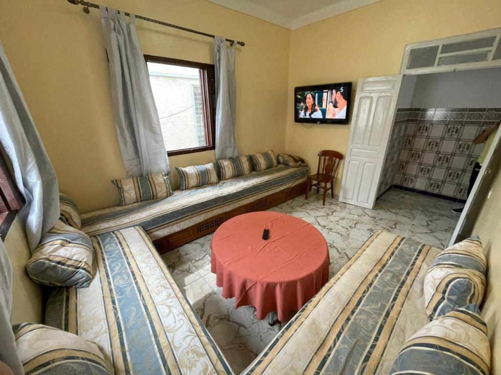 TV a/nebo společenská místnost v ubytování Appartement Beauté Martil