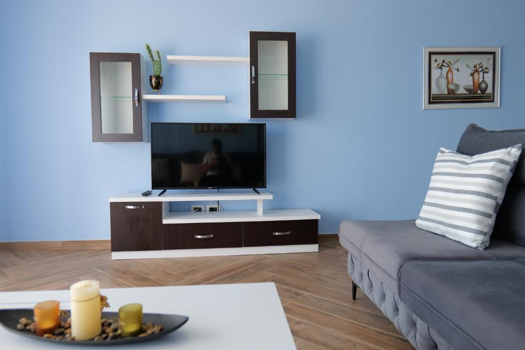 TV a/nebo společenská místnost v ubytování Kosta Apartments