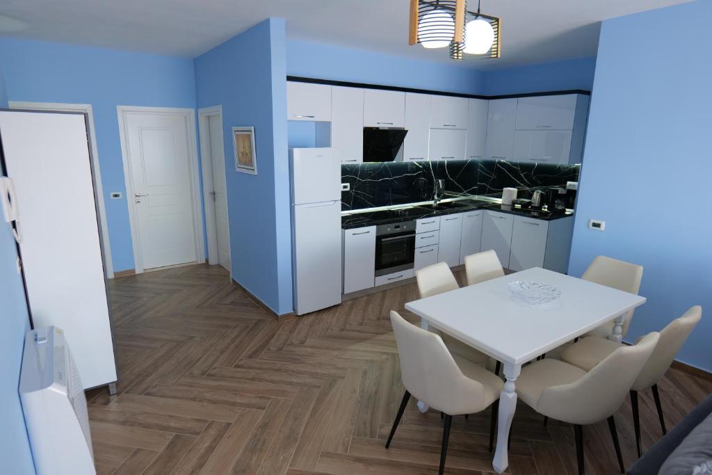 Kuchyň nebo kuchyňský kout v ubytování Kosta Apartments