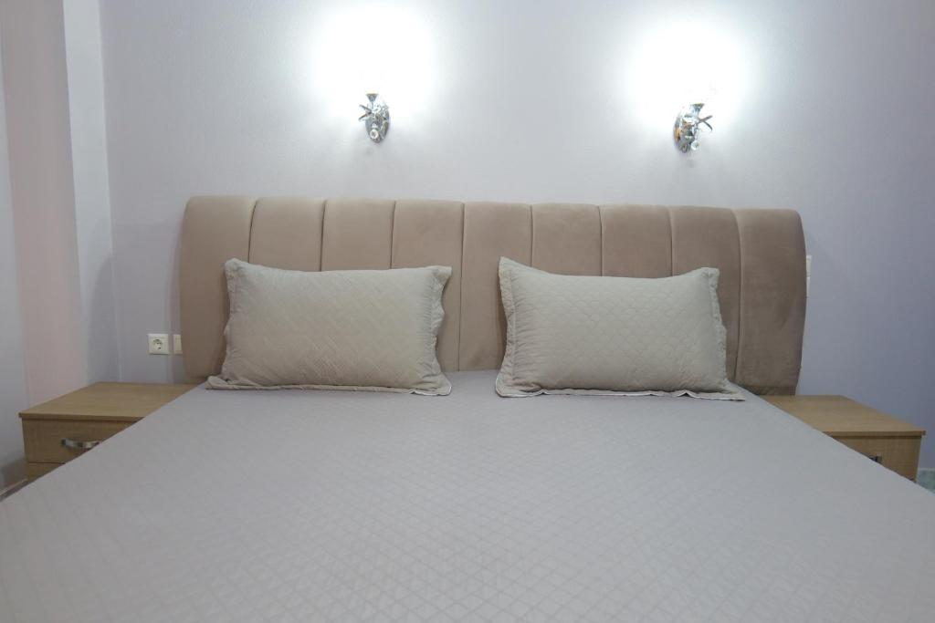 Postel nebo postele na pokoji v ubytování Kosta Apartments