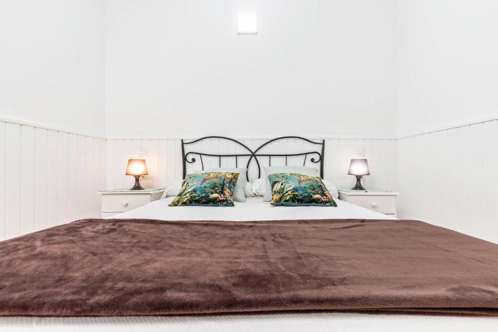 A bed or beds in a room at Savoa Sea 365