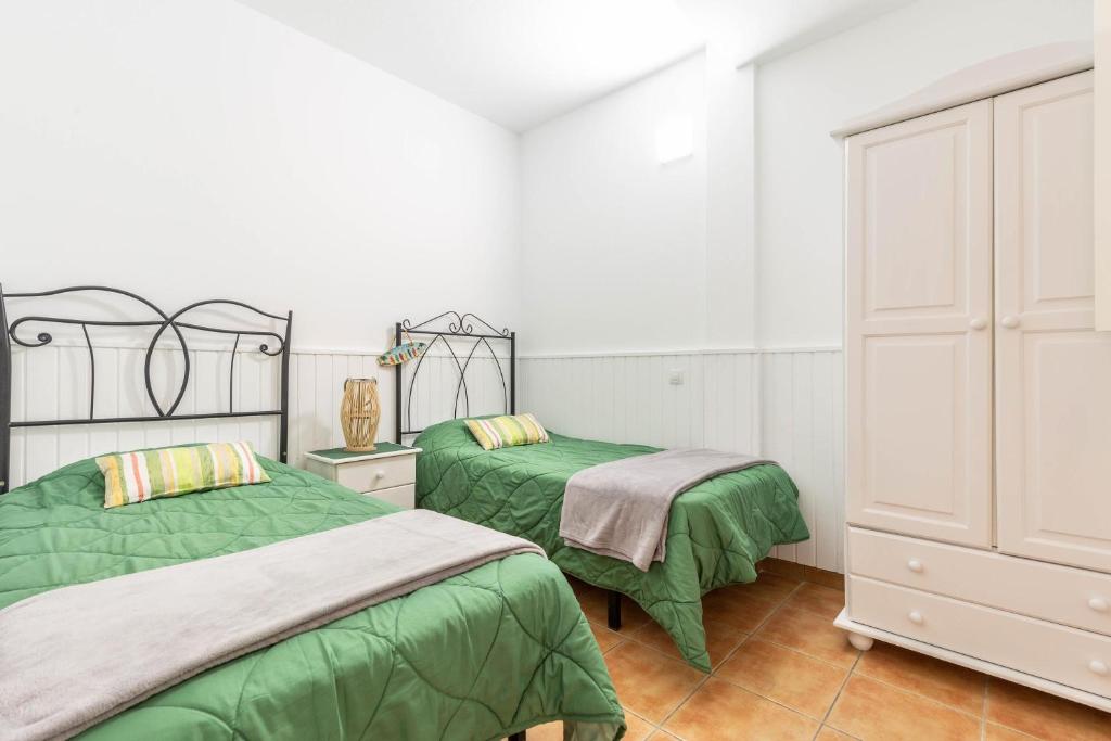 A bed or beds in a room at Savoa Sea 365