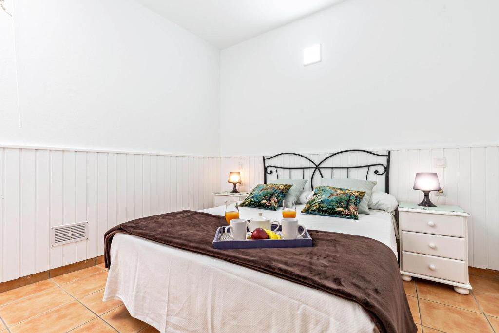 A bed or beds in a room at Savoa Sea 365