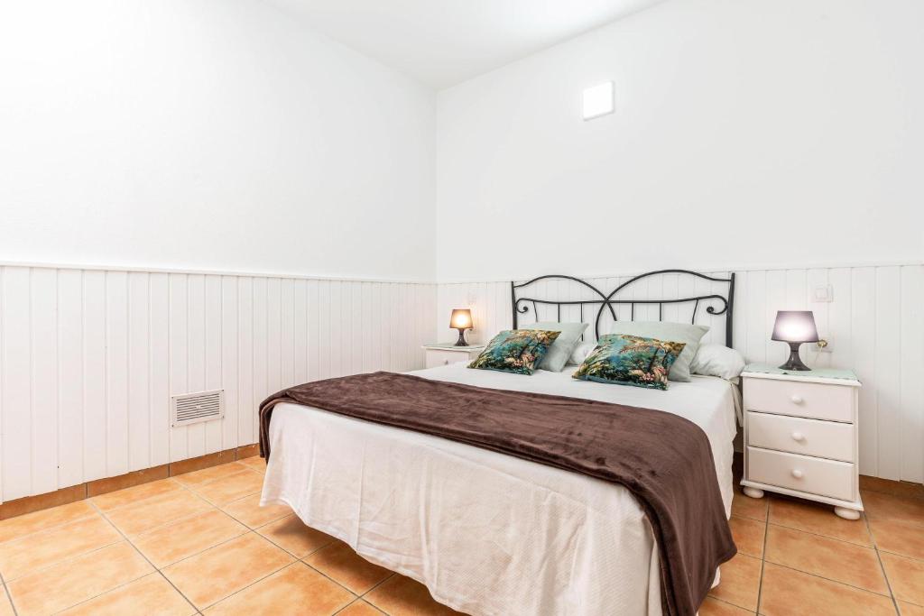 A bed or beds in a room at Savoa Sea 365