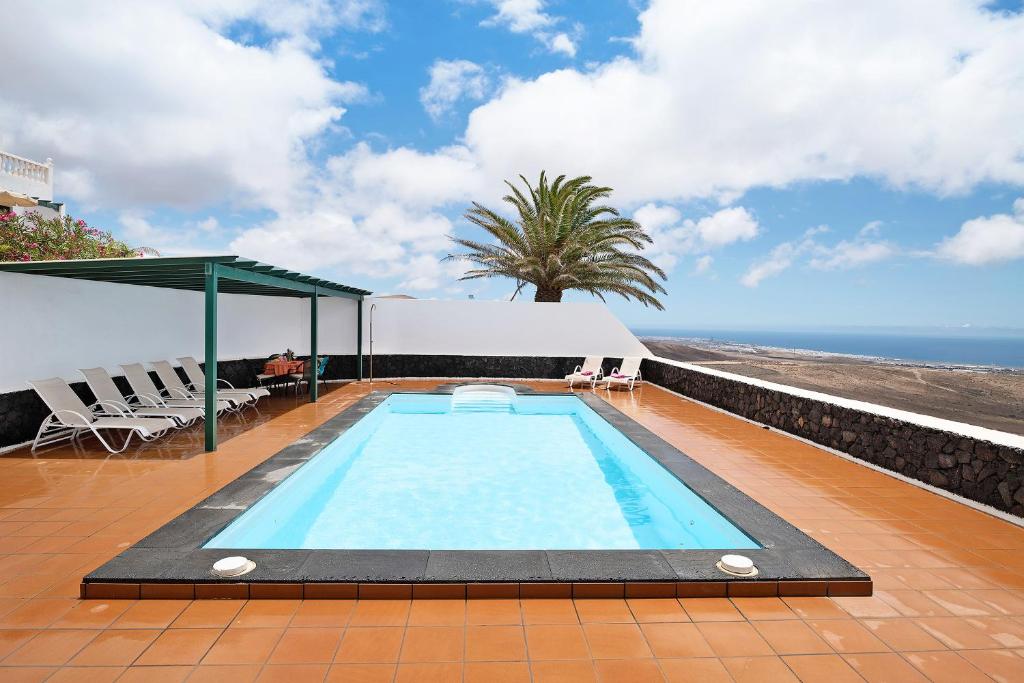 Bazén v ubytování La Vega de Lanzarote 4 nebo v jeho okolí