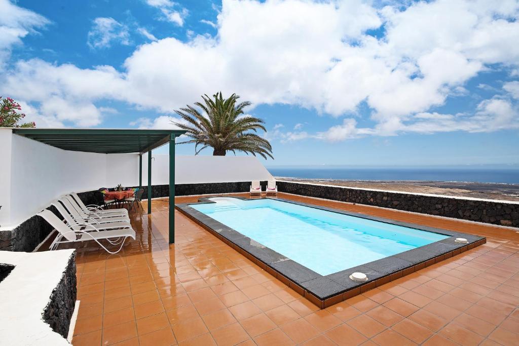 Bazén v ubytování La Vega de Lanzarote 4 nebo v jeho okolí