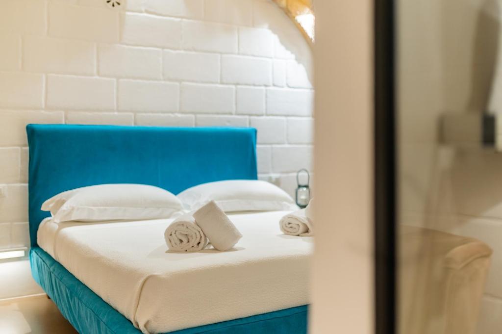 Postel nebo postele na pokoji v ubytování B&B A C-Caste