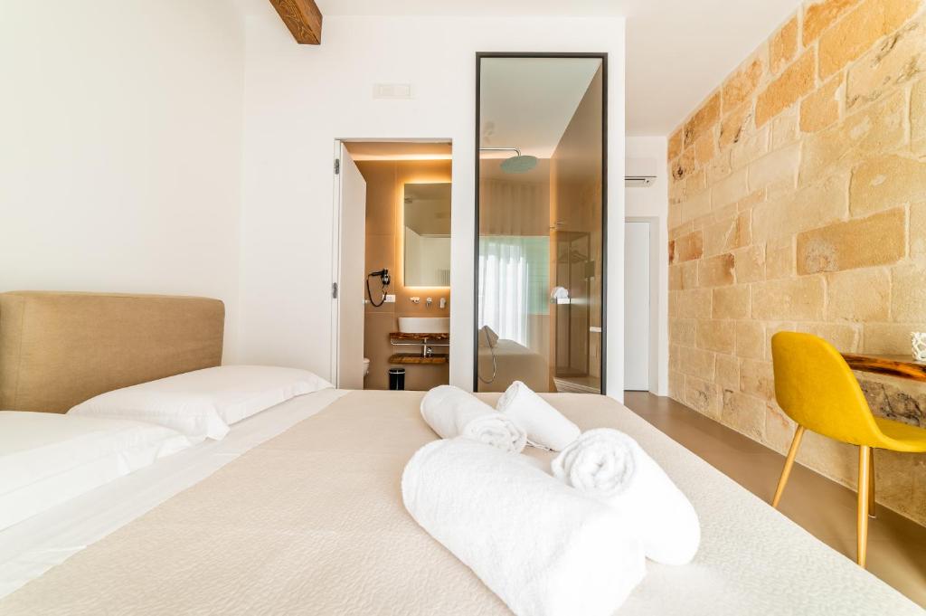 Postel nebo postele na pokoji v ubytování B&B A C-Caste