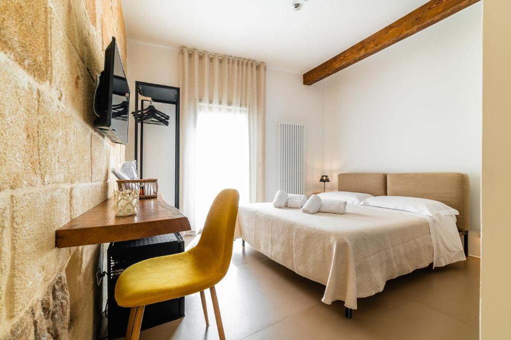 Postel nebo postele na pokoji v ubytování B&B A C-Caste