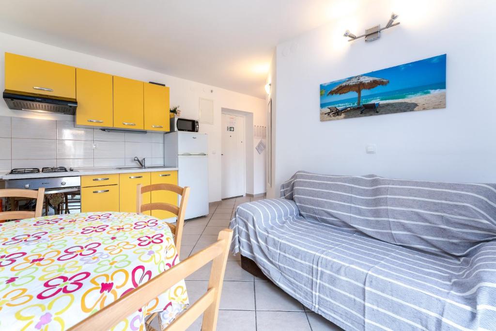 Kuchyň nebo kuchyňský kout v ubytování Apartmani RUBESSA