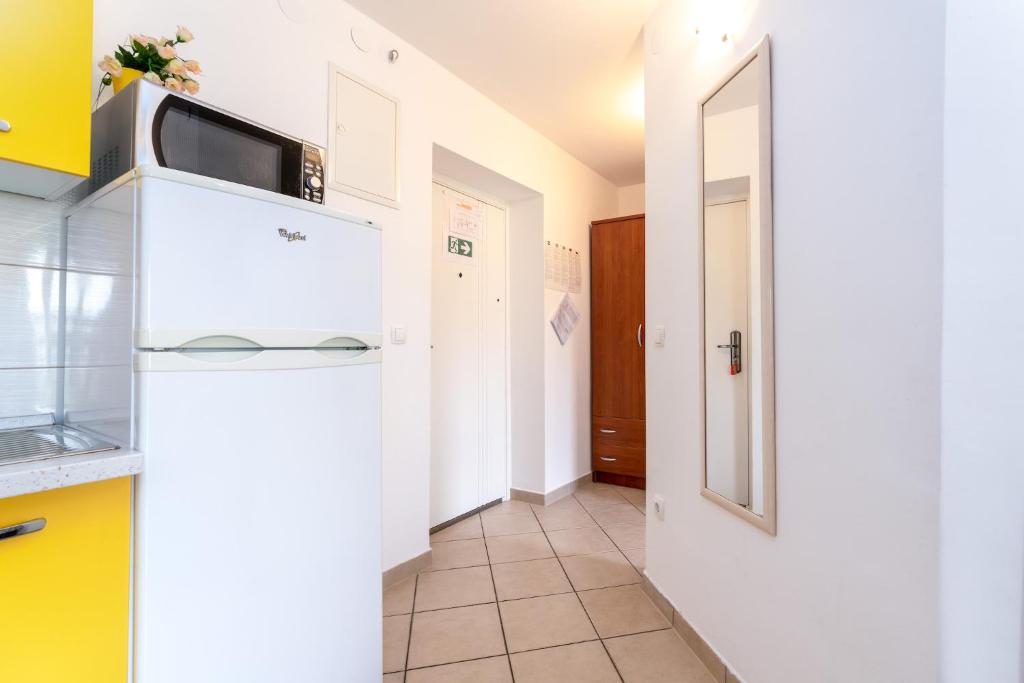 Kuchyň nebo kuchyňský kout v ubytování Apartmani RUBESSA