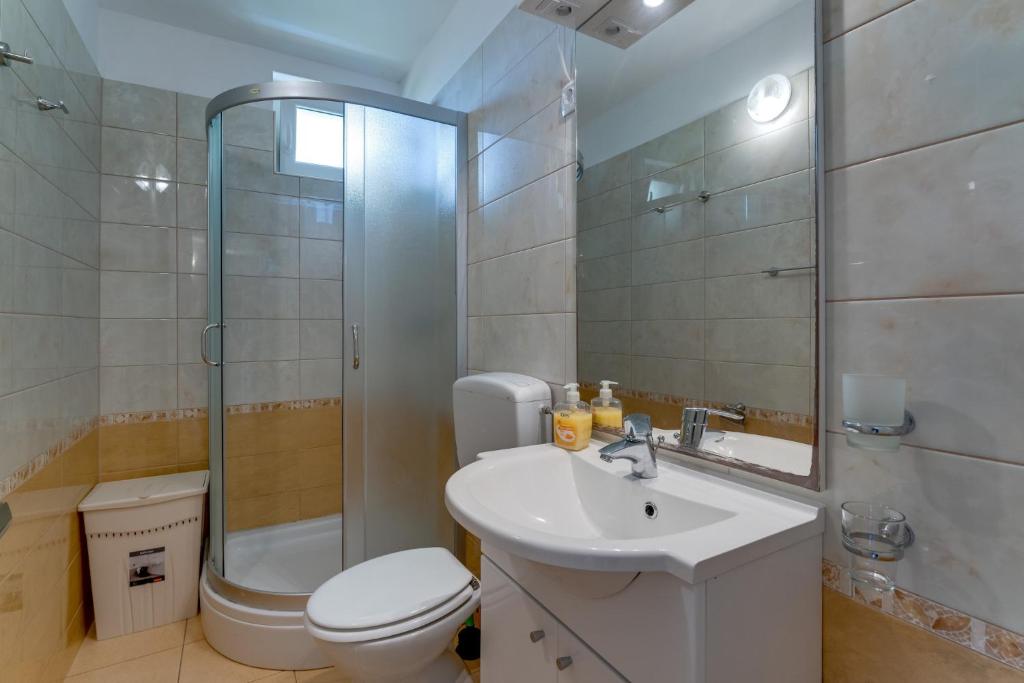 Koupelna v ubytování Apartmani RUBESSA