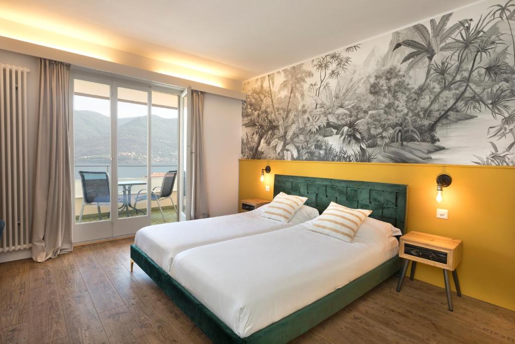 Postel nebo postele na pokoji v ubytování Garden Hotel Primavera