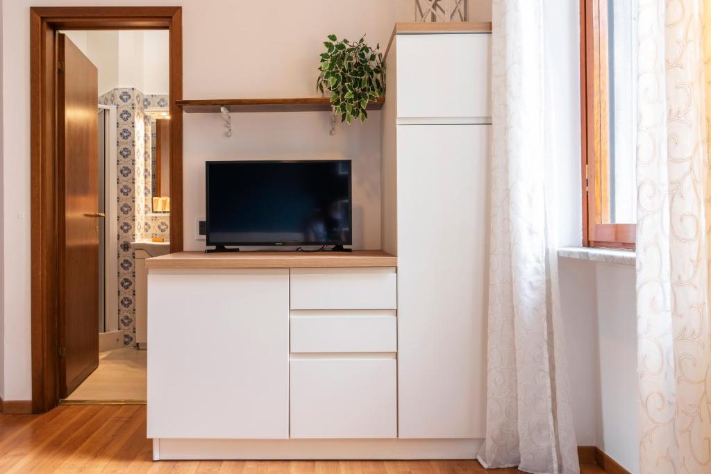 Kuchyňa alebo kuchynka v ubytovaní Casa Blu Flexyrent apartment WiFi - NO AC
