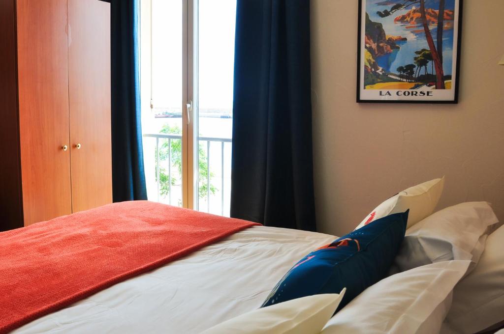 Postel nebo postele na pokoji v ubytování Hôtel Posta Vecchia
