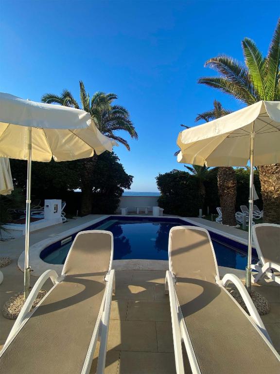 The swimming pool at or close to BlueBay Residence Resort