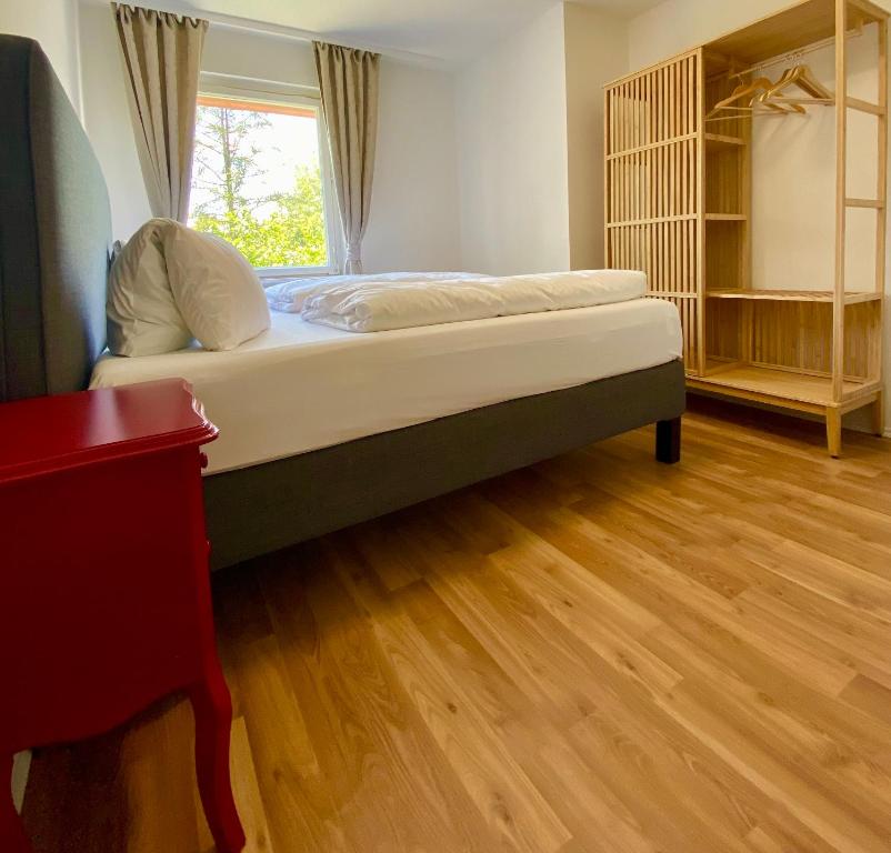 Ένα ή περισσότερα κρεβάτια σε δωμάτιο στο B&B Rohrer am Murradweg - Ehrenhausen an der Weinstrasse