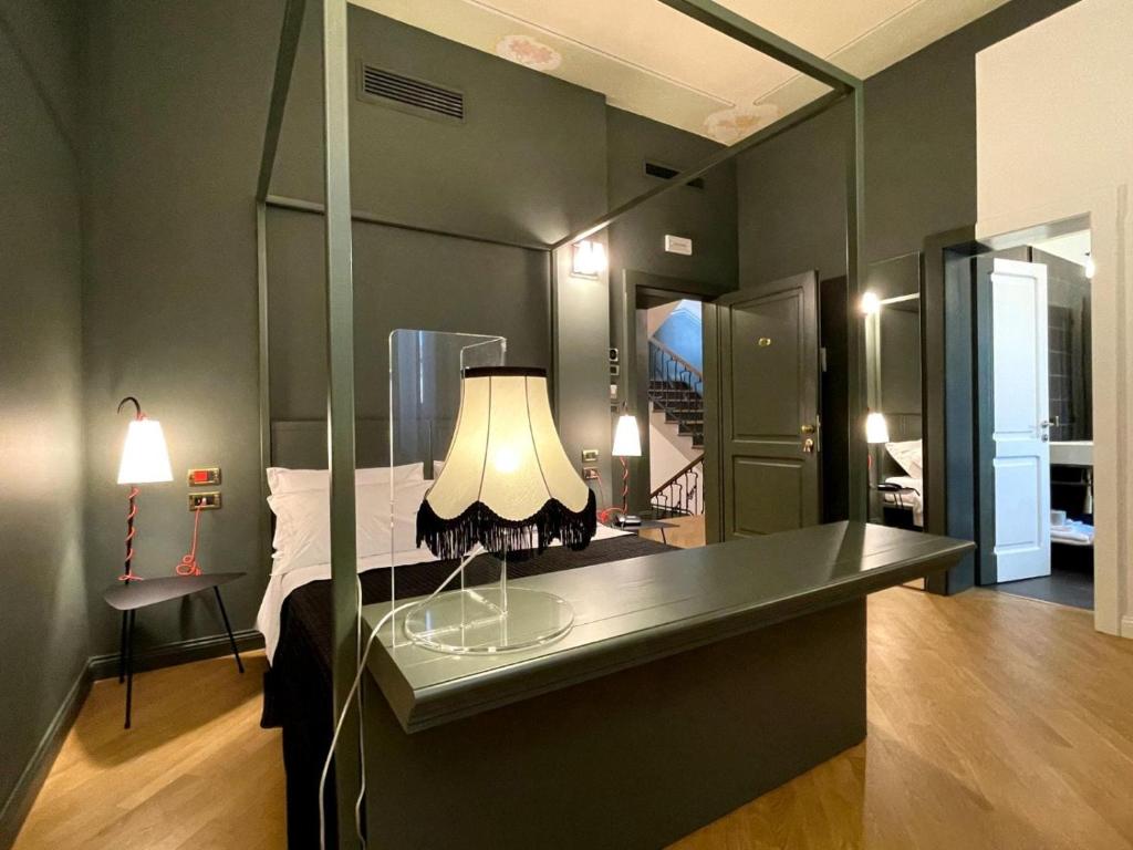 Cama ou camas em um quarto em Villa Raffaello Park Hotel
