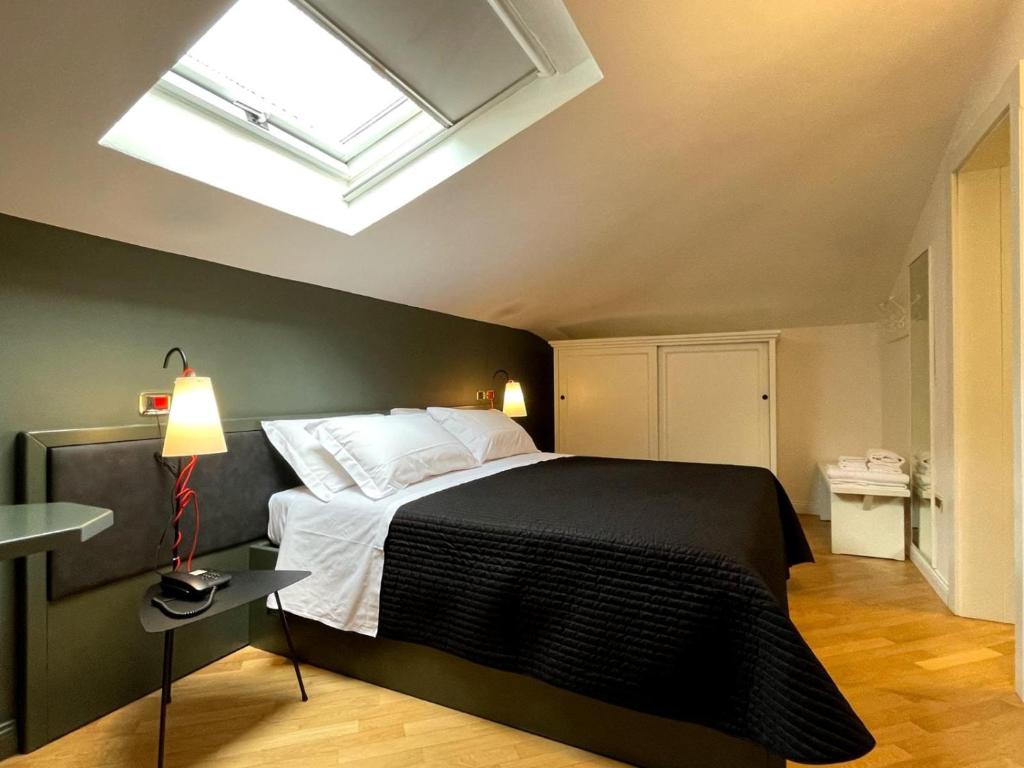 Cama ou camas em um quarto em Villa Raffaello Park Hotel