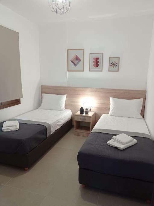 Postel nebo postele na pokoji v ubytování Melograno Apartment