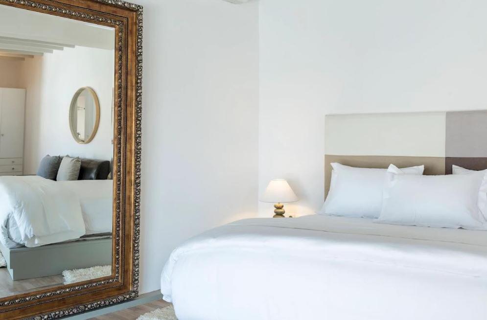 Postel nebo postele na pokoji v ubytování Greco Philia Hotel Boutique