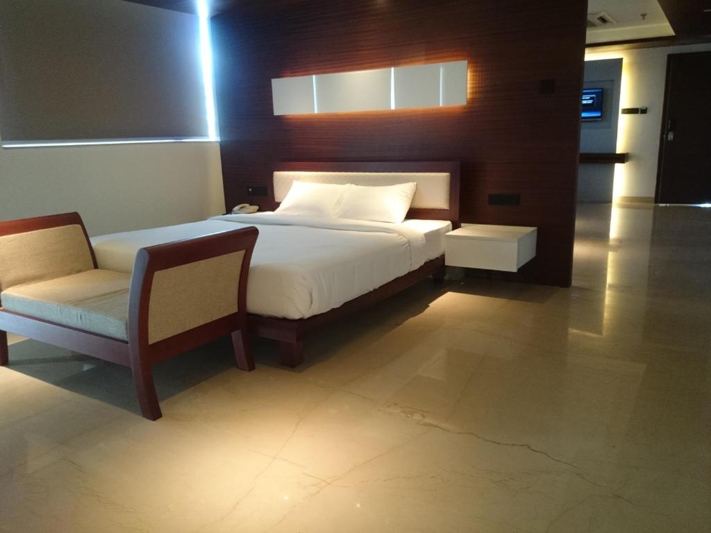 Postel nebo postele na pokoji v ubytování Diana Heights Luxury Hotel