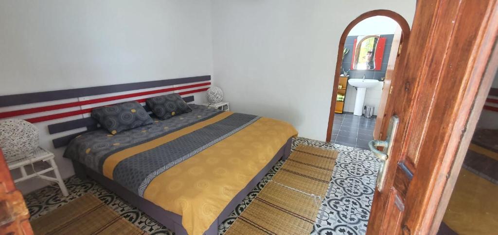 Postel nebo postele na pokoji v ubytování Villa Zahra