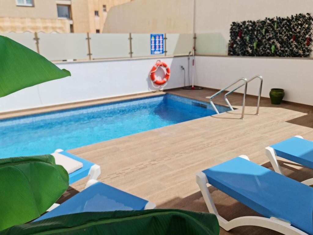 The swimming pool at or near Brand new Exclusive apartment, 150 meter from the Beach