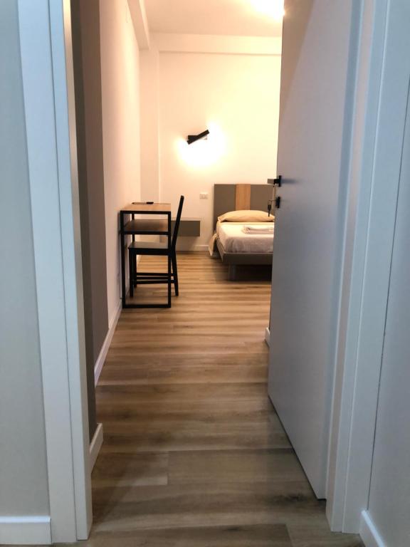 Postel nebo postele na pokoji v ubytování A Due Passi Dalla Scalinata Rooms