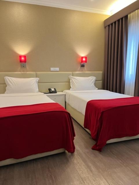 Postel nebo postele na pokoji v ubytování Seculo Hotel