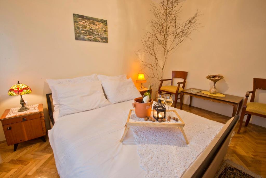 Postel nebo postele na pokoji v ubytování Guesthouse Žganjer