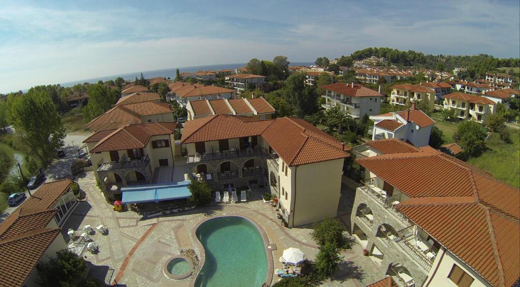an aerial view of a house with a swimming pool at Hotel Argo in Siviri