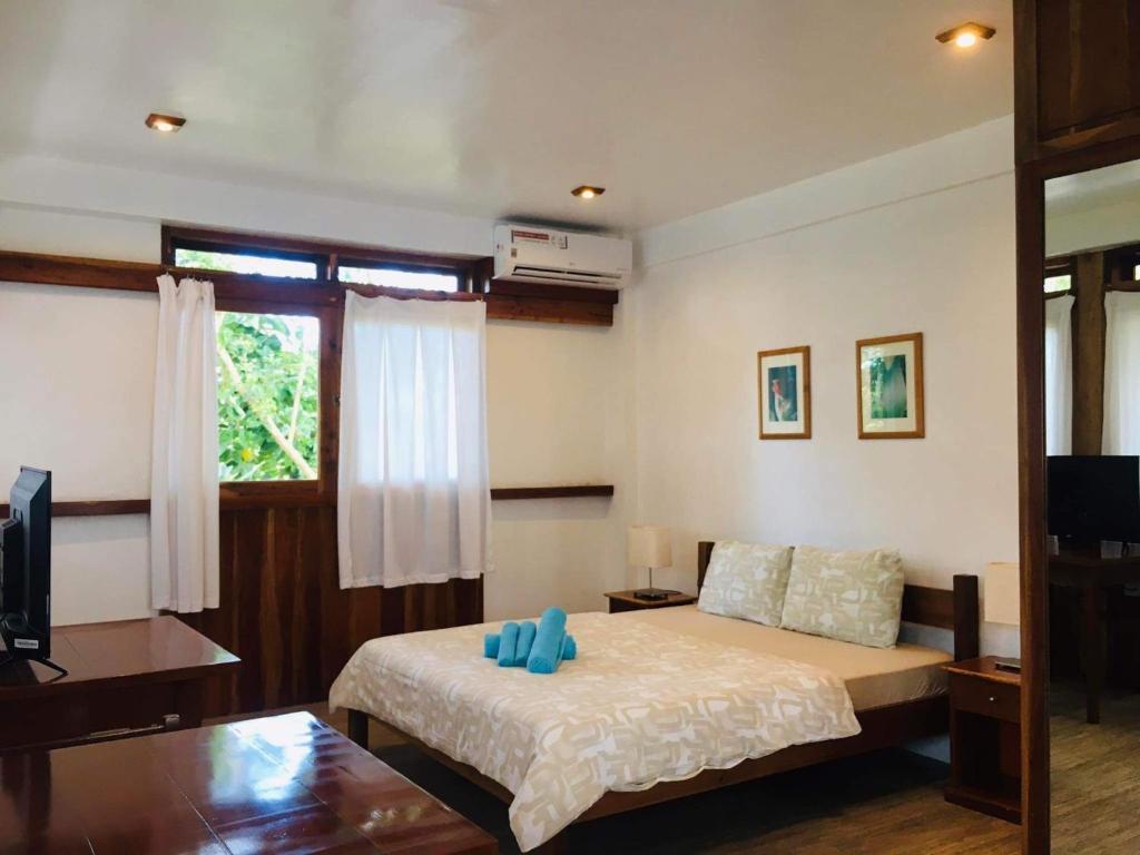 Giường trong phòng chung tại Pahiluna Guesthouse